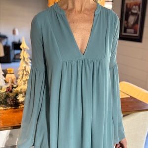 Light blue size Xs, Show me your MuMu long flowing top.